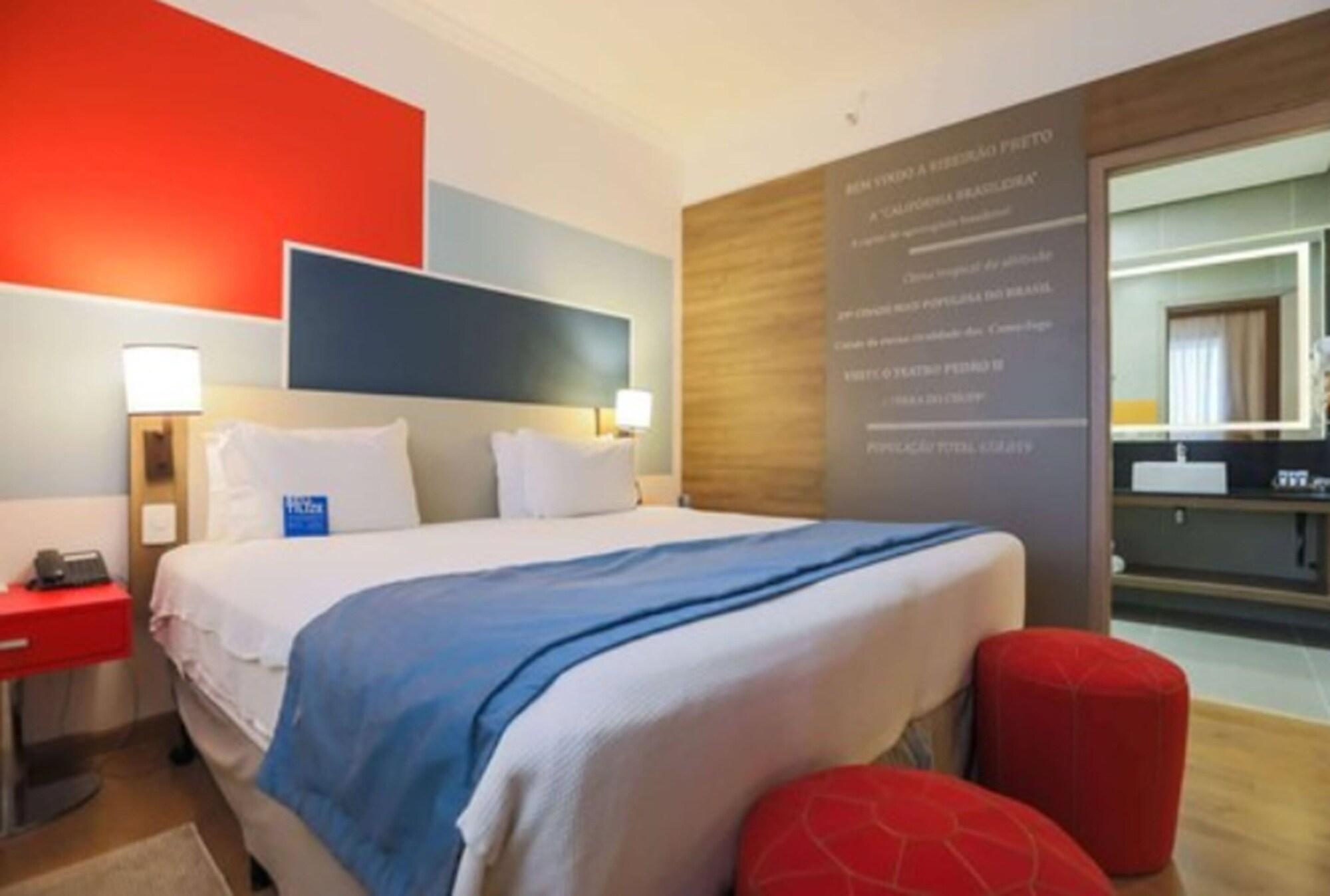Tryp By Wyndham Ribeirao Preto Hotel Exterior photo A room at the hotel