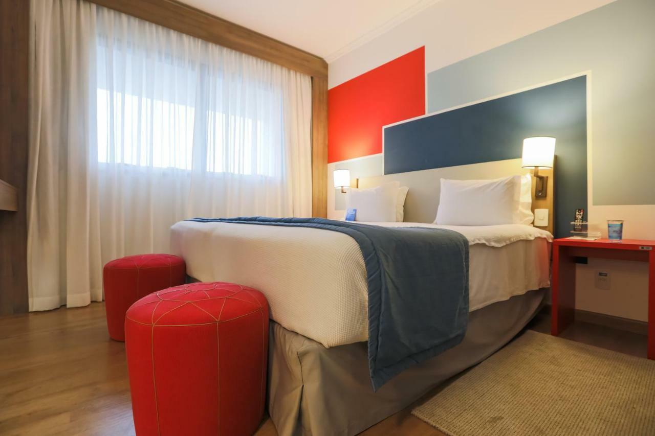 Tryp By Wyndham Ribeirao Preto Hotel Exterior photo A room at the hotel